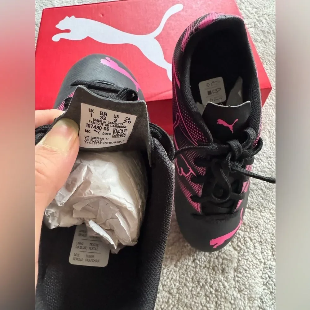 Puma Black and Pink Athletic Cleats
